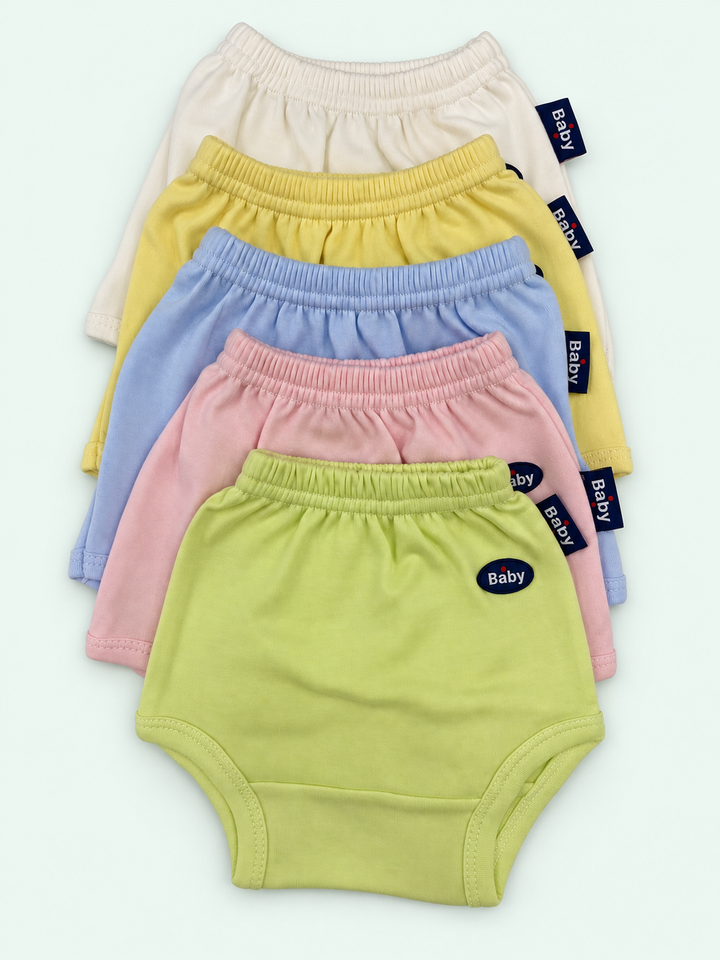 100% cotton baby pull-on briefs in cream, yellow, light blue, pink and lime green, stacked on pastel mint