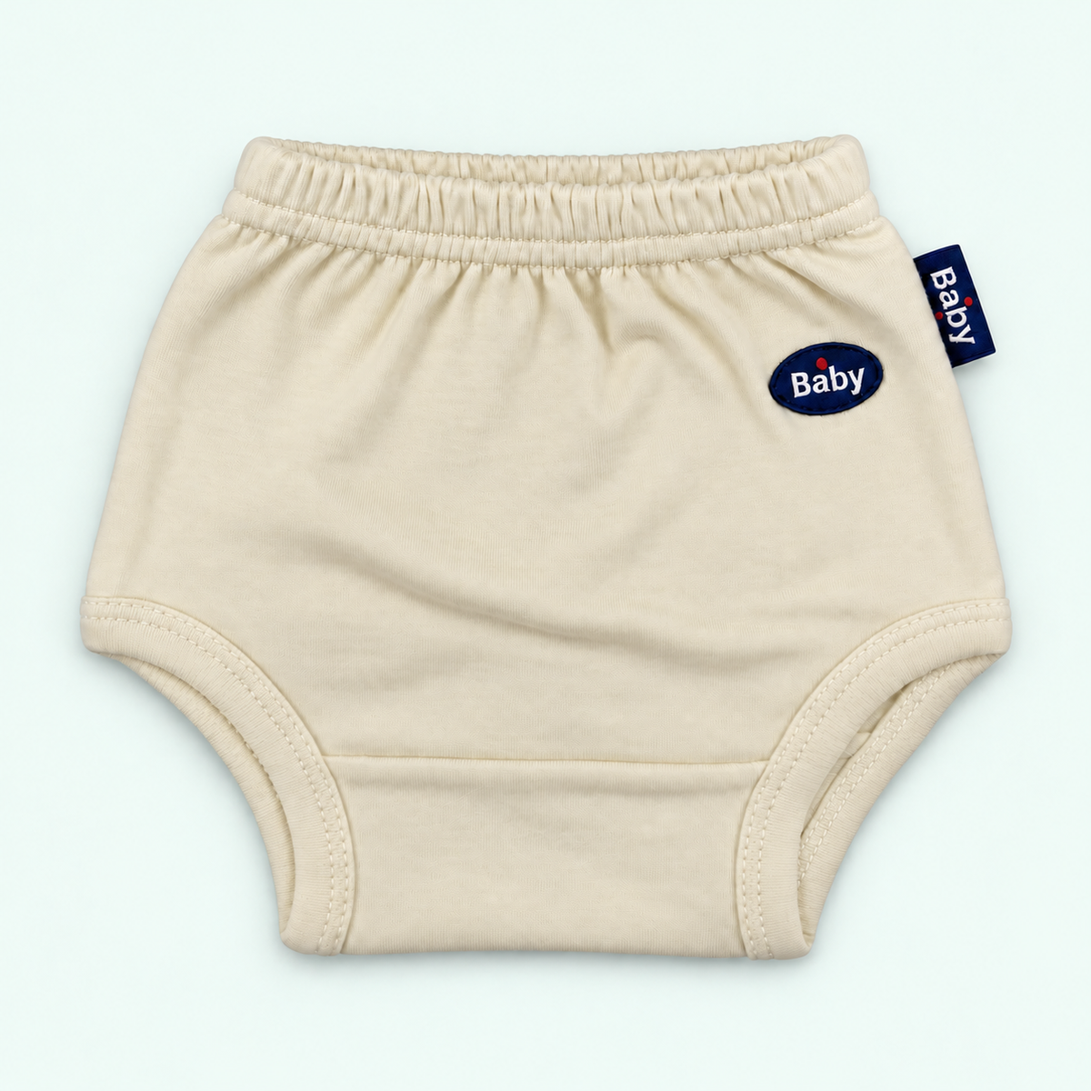 100% cotton baby pull-on briefs in Cream with Baby label on pastel mint