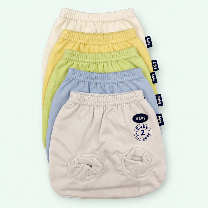 Baby Soft-Cuff Briefs, 100% Cotton, all colors stacked, on pastel mint background