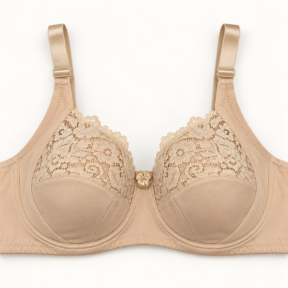 Light beige push-up bra with floral-lace upper cup panels and smooth seamed lower panels. Finished with wide straps and a centre bow.