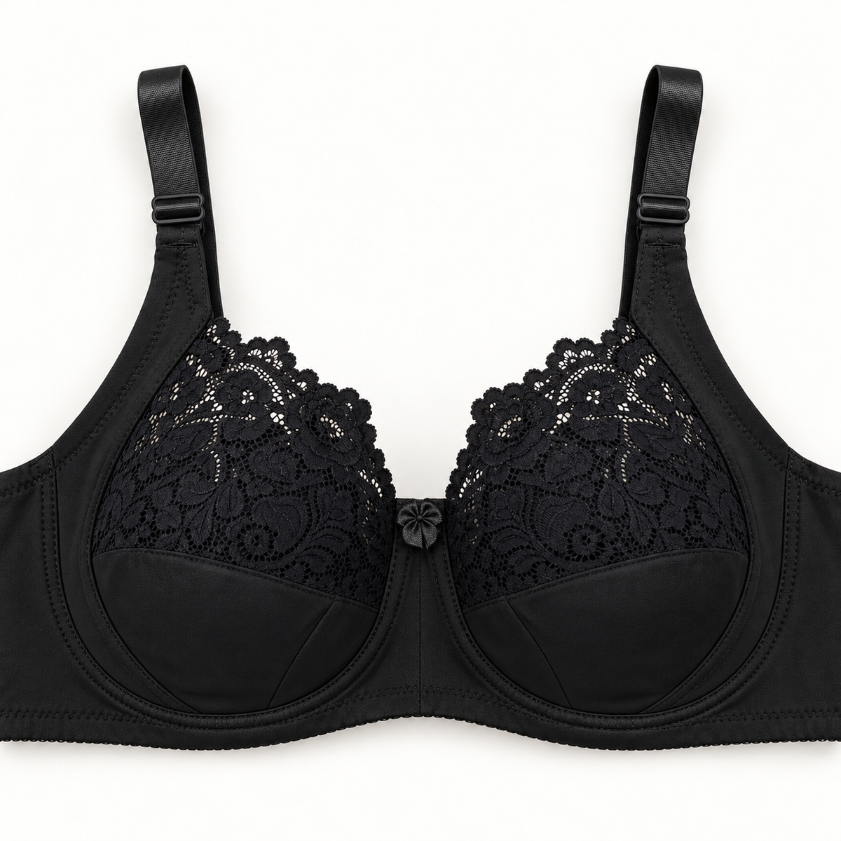 Black lace-panel unpadded push-up bra with floral-lace upper cups, smooth seamed lower panels, wide adjustable straps and centre bow.