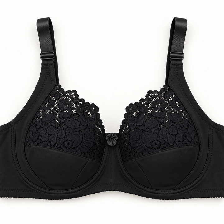 Black lace-panel unpadded push-up bra with floral-lace upper cups, smooth seamed lower panels, wide adjustable straps and centre bow.