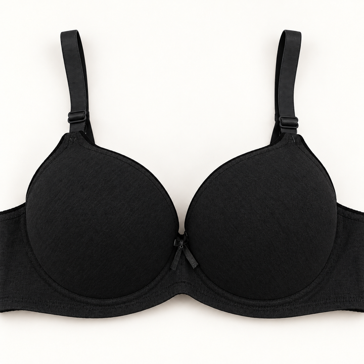 Black push-up bra with black trim and matching adjustable straps, front view.