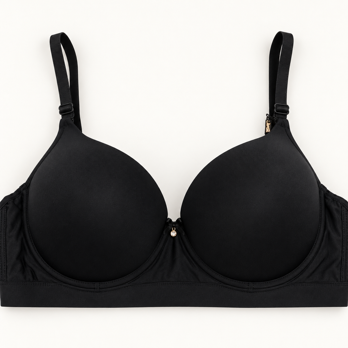 Black push-up bra with smooth cups, a plain band and a small centre bow.