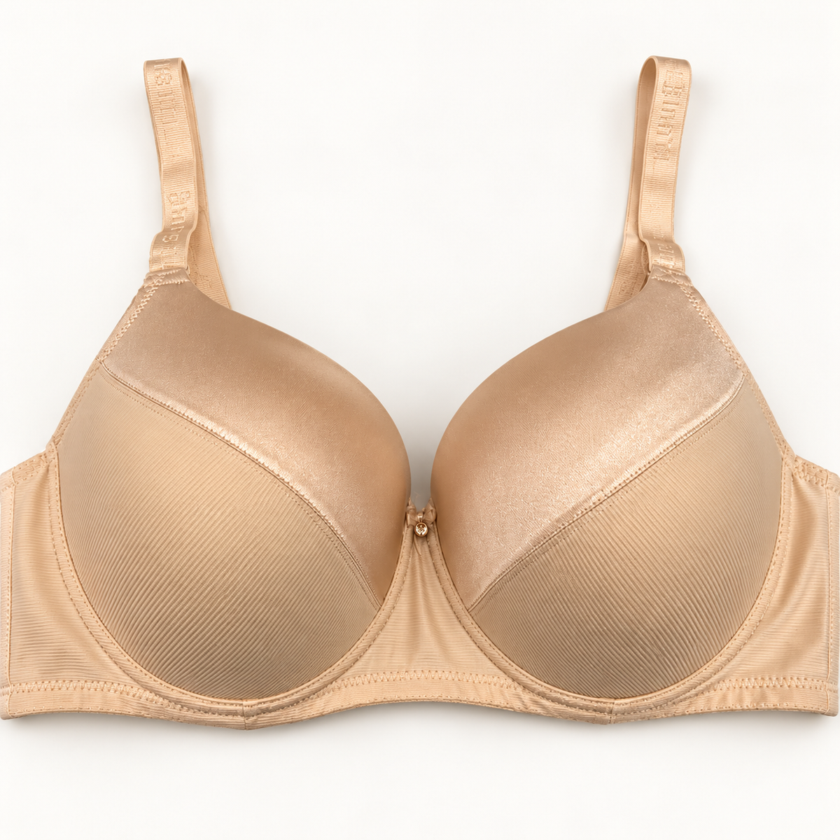 Champagne beige push-up bra with diagonally divided cups and contrasting surface finishes. Finished with a plain band and matching straps.