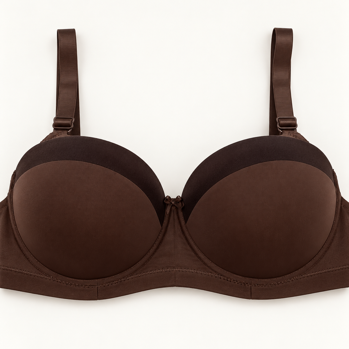 Dark brown push-up bra with darker curved panels along the upper cups. Finished with matching straps, a plain stitched band and a small centre bow.