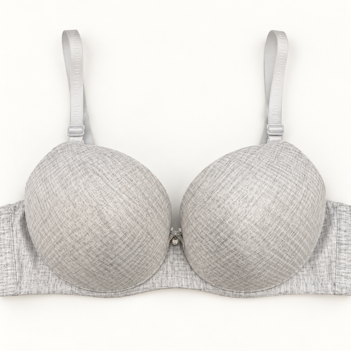 Light grey push-up bra with a fine crosshatch pattern across the cups and band. Finished with pale adjustable straps and a small centre detail.