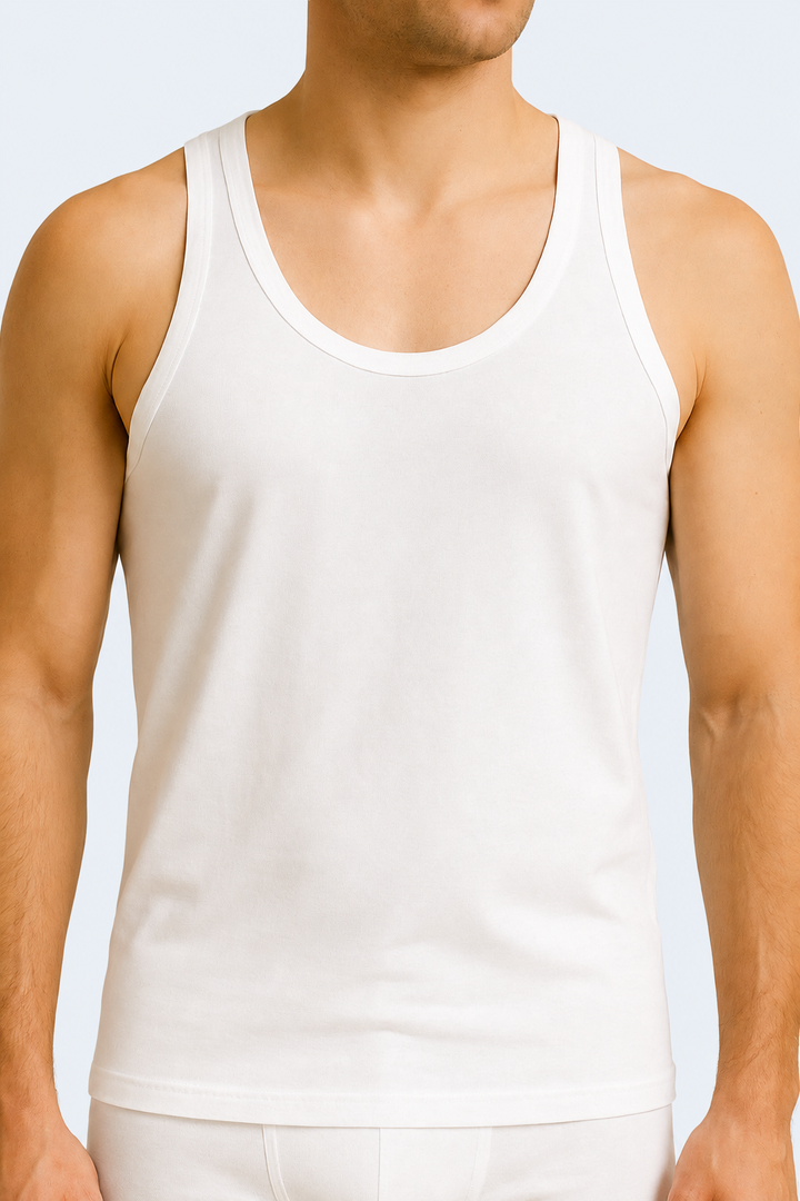 White tank top worn by a person on a beige background